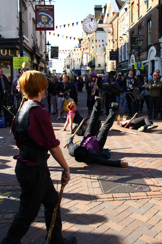 people in the street on the floor are playing with the items