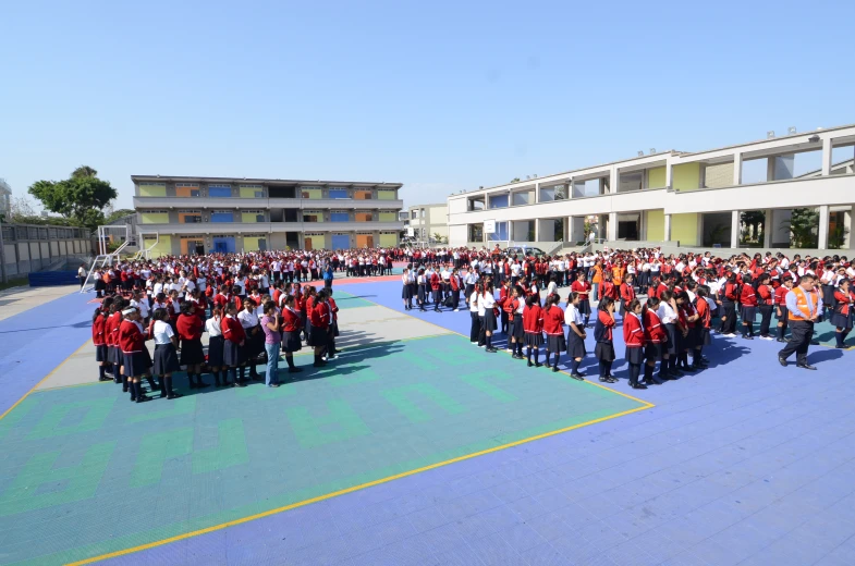 a group of people standing in front of a building