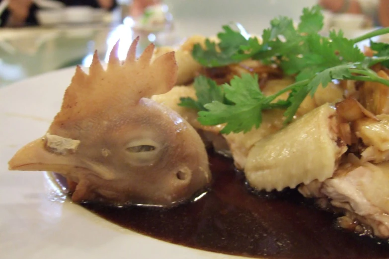 a plate has pasta and mushrooms with sauce