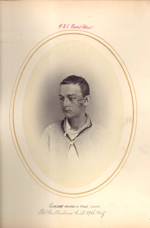 an old pograph of a man with short hair