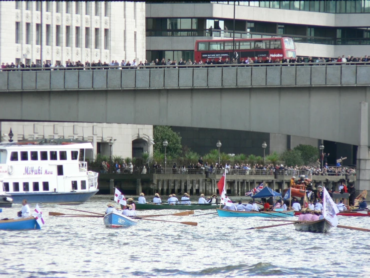 many boats and people on a river