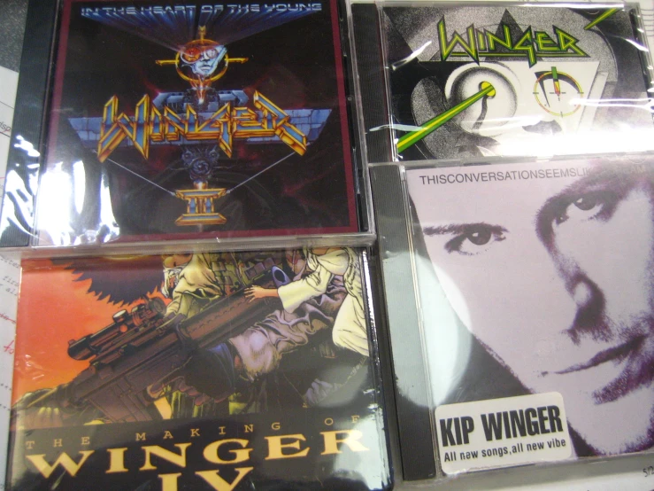 several cd's on display in a store