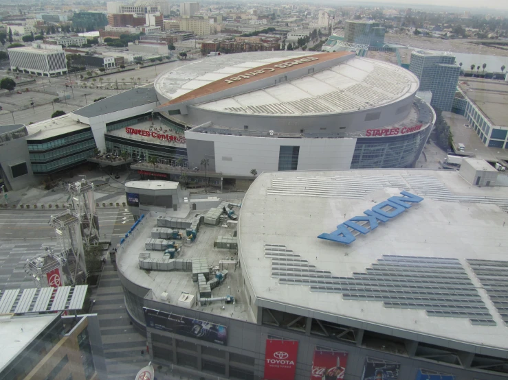 an aerial view of the new arena, with people working in the stands