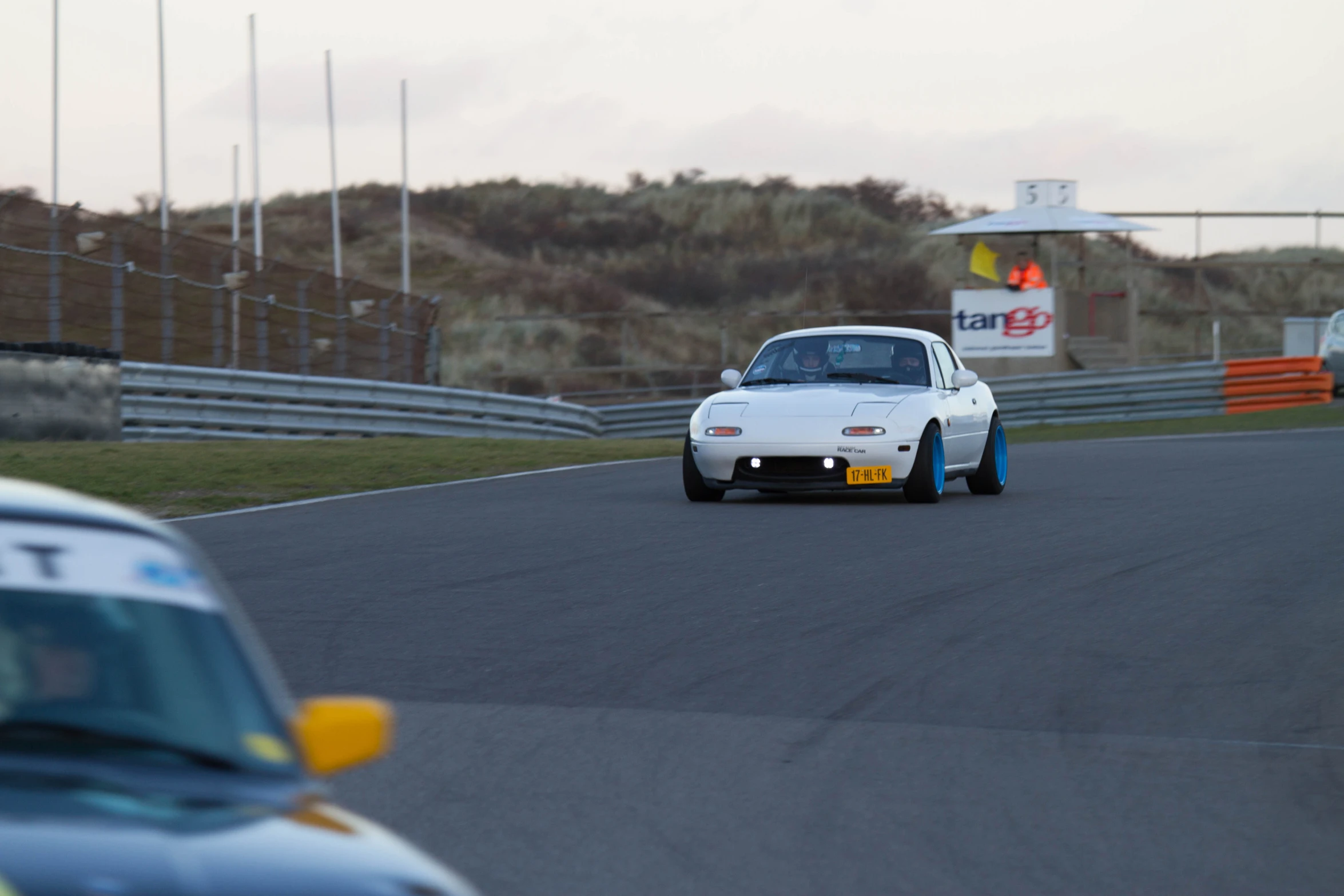 two cars passing each other on the track