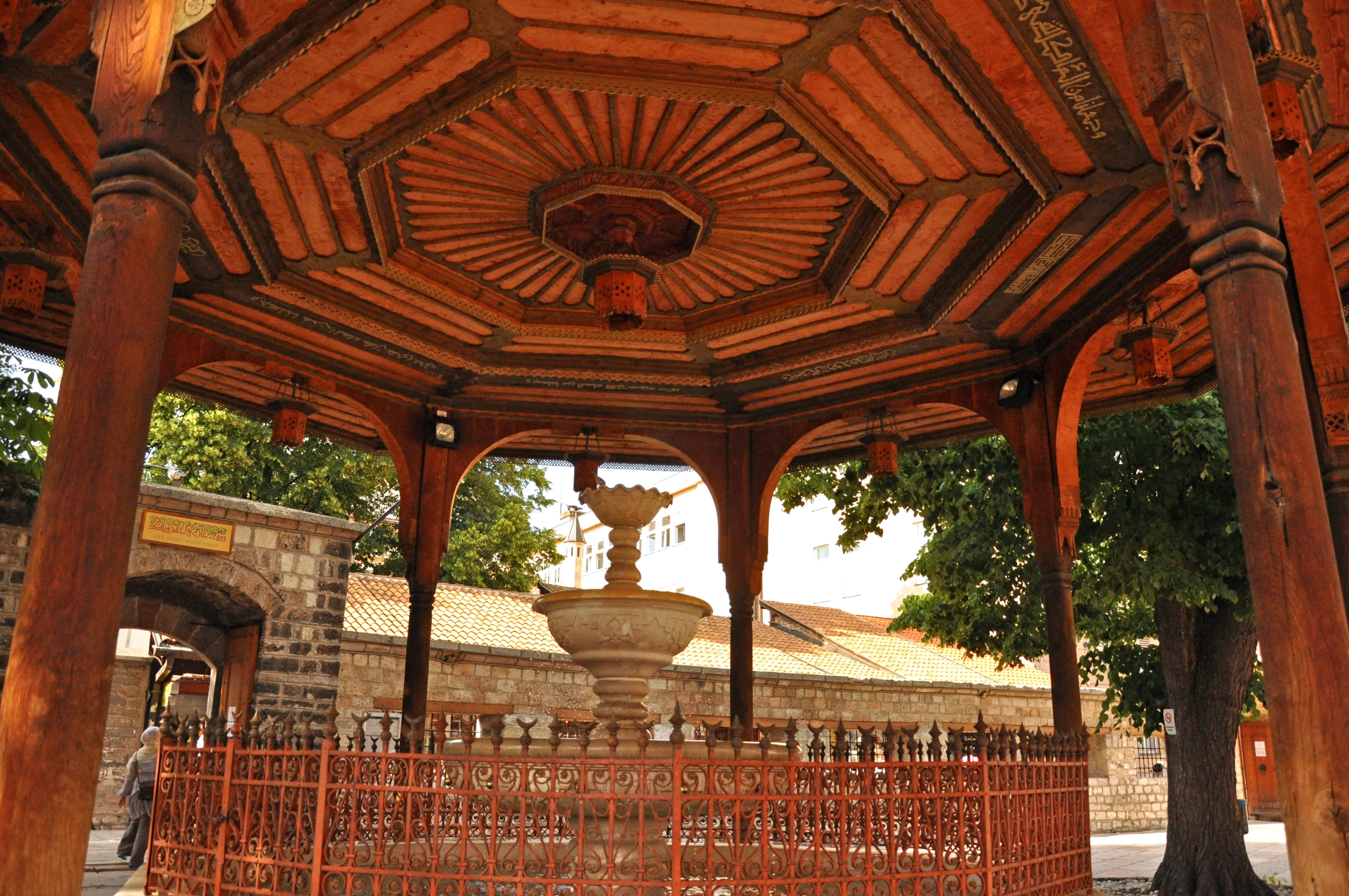 a large, intricate gazebo with a fountain in it