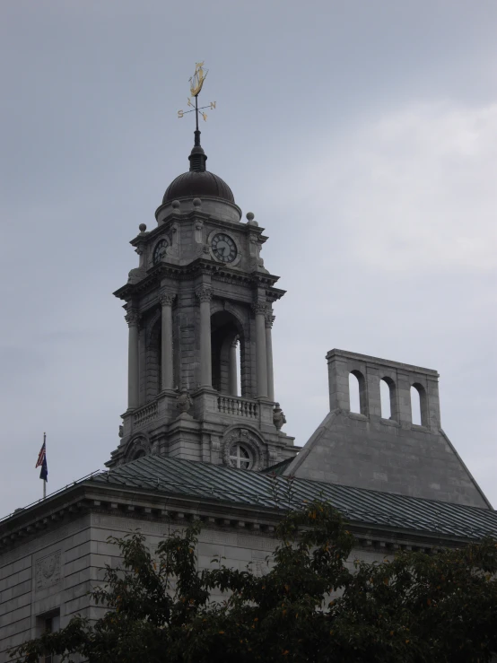 an old building has a clock tower on top