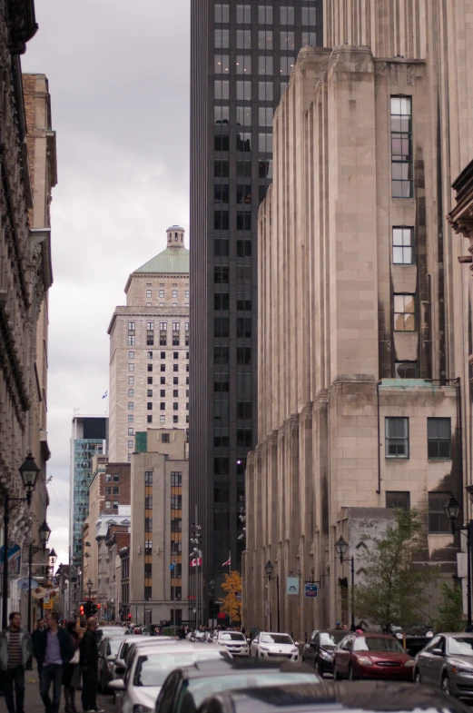 a city filled with tall buildings on a cloudy day