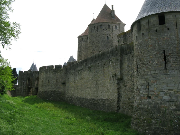 this is the view from behind an old castle wall