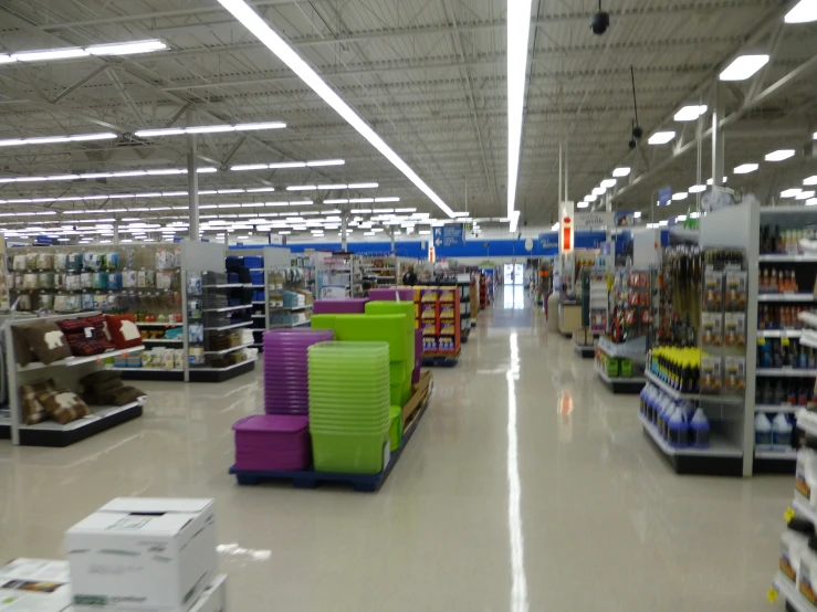 a grocery store aisle with lots of different goods