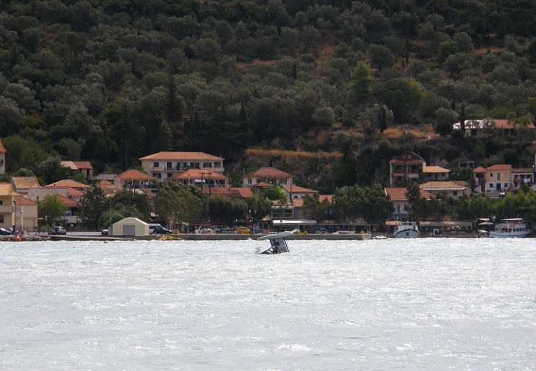 there is an image of a city on the lake