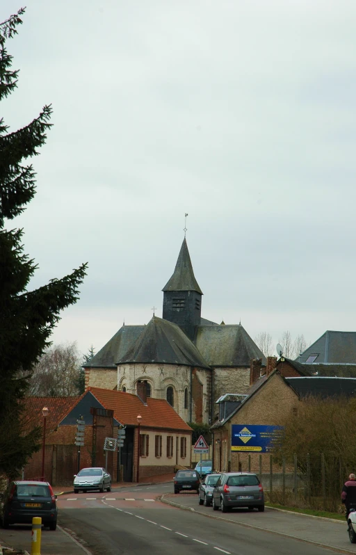 a large old building with some tall towers