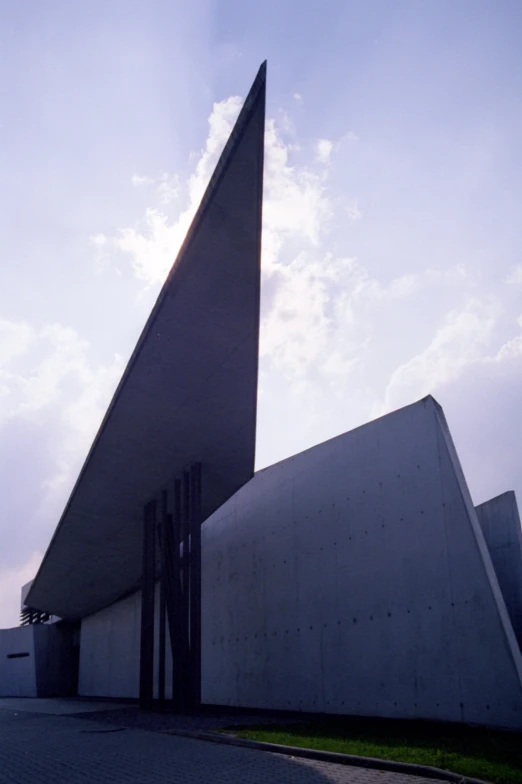 a large triangular structure on a street