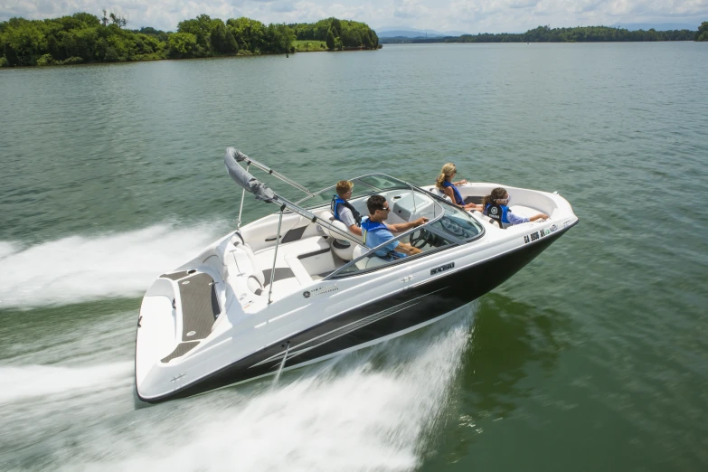 a speed boat is traveling down the water