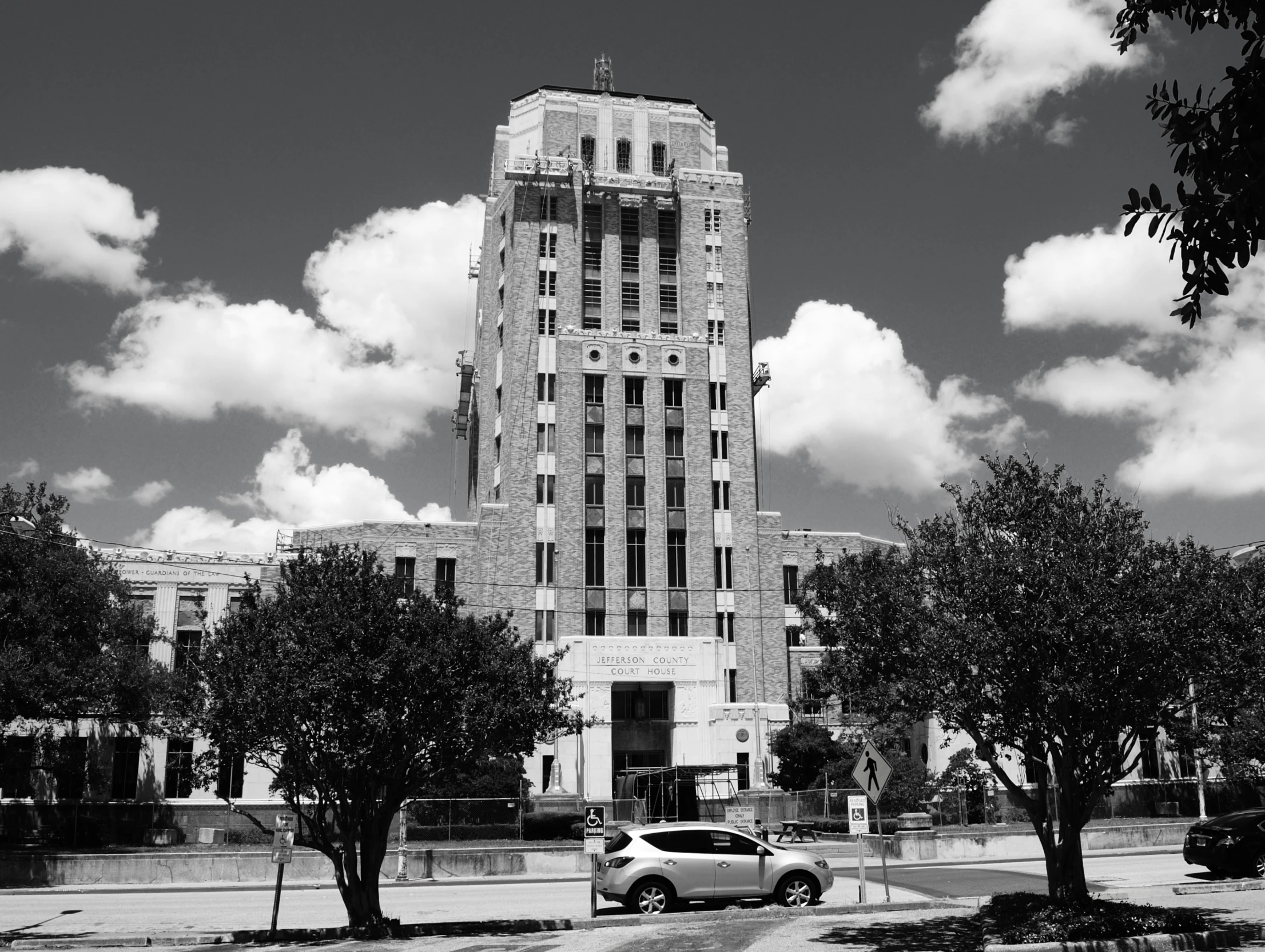 an old building has a tower that is taller than it