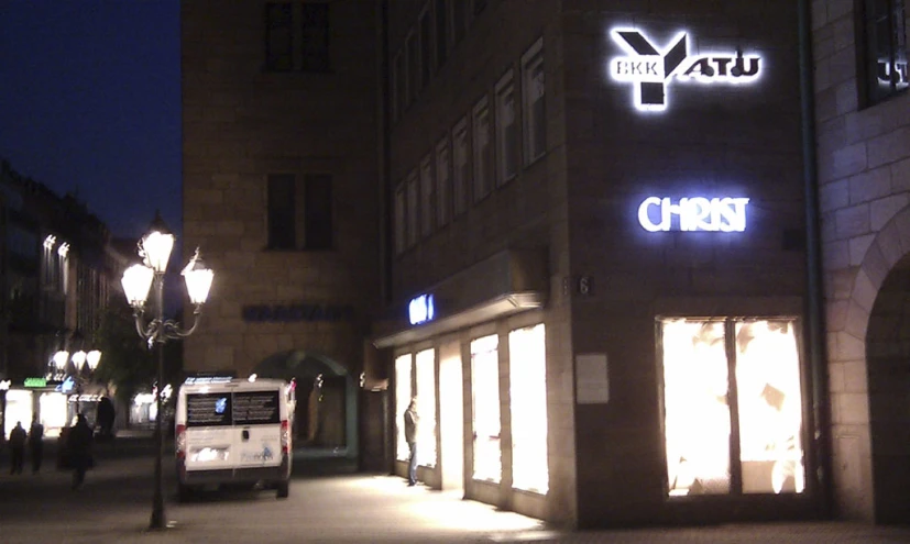 an outside view of a building and a truck