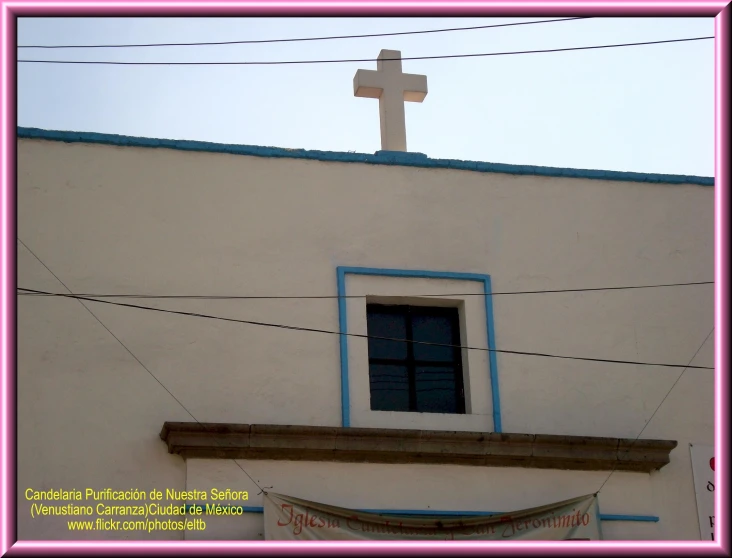 a church has a cross on top of it