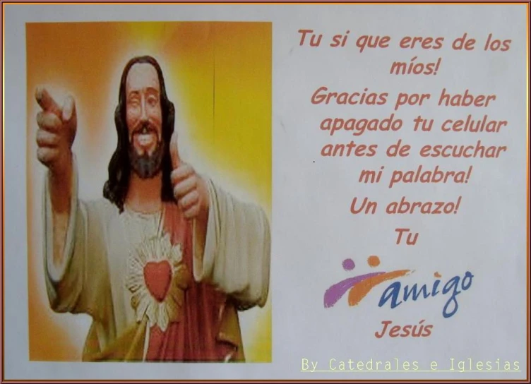 a sign written in spanish has a po of jesus giving thumbs up