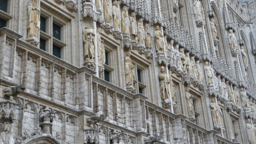 a close up of the facade and windows of a building