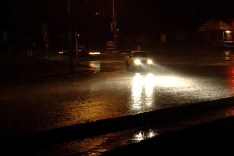 a picture of some people on the street at night