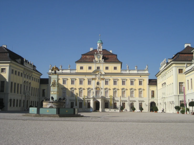 an old building with many towers on top