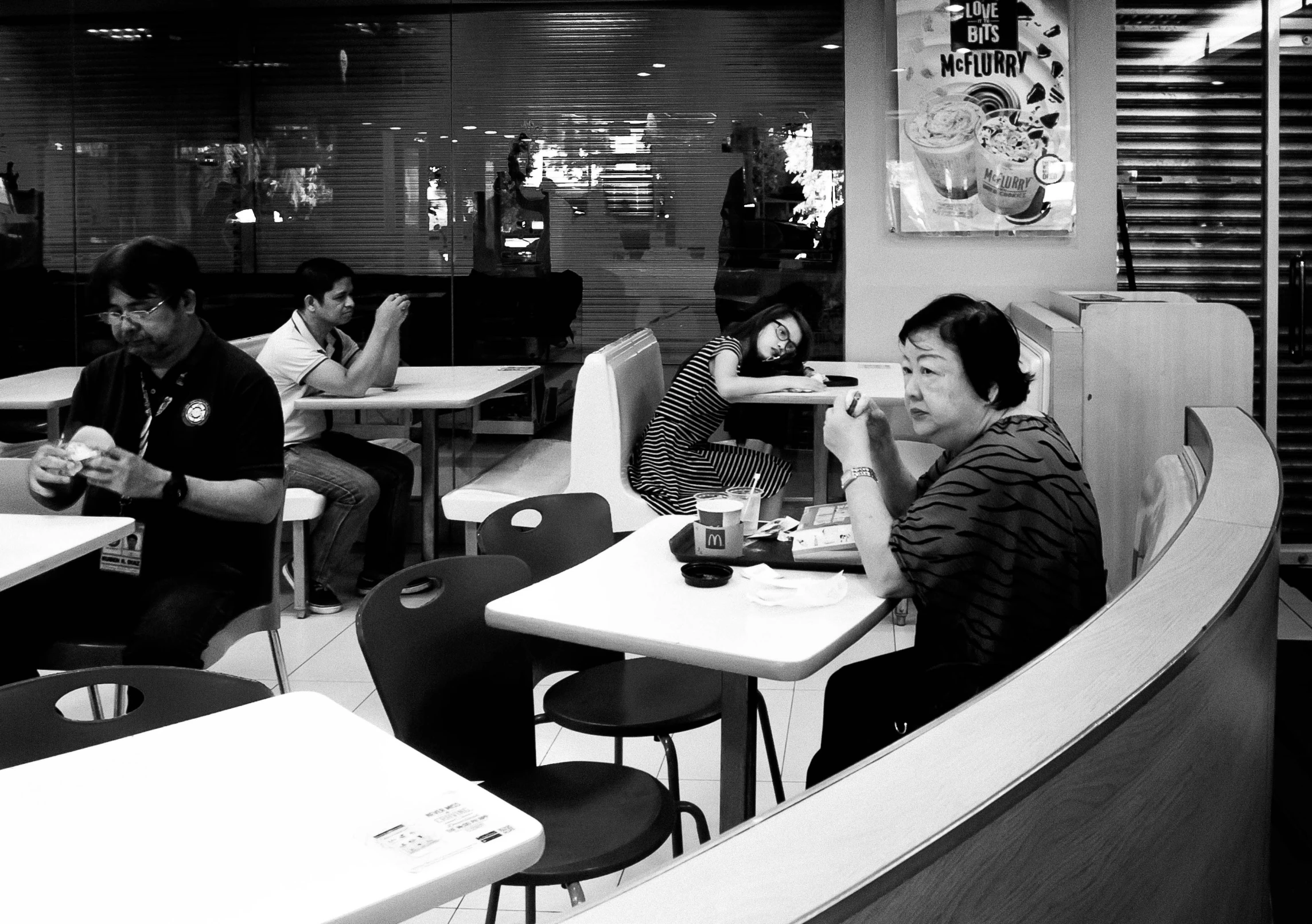 people eating at tables in a restaurant