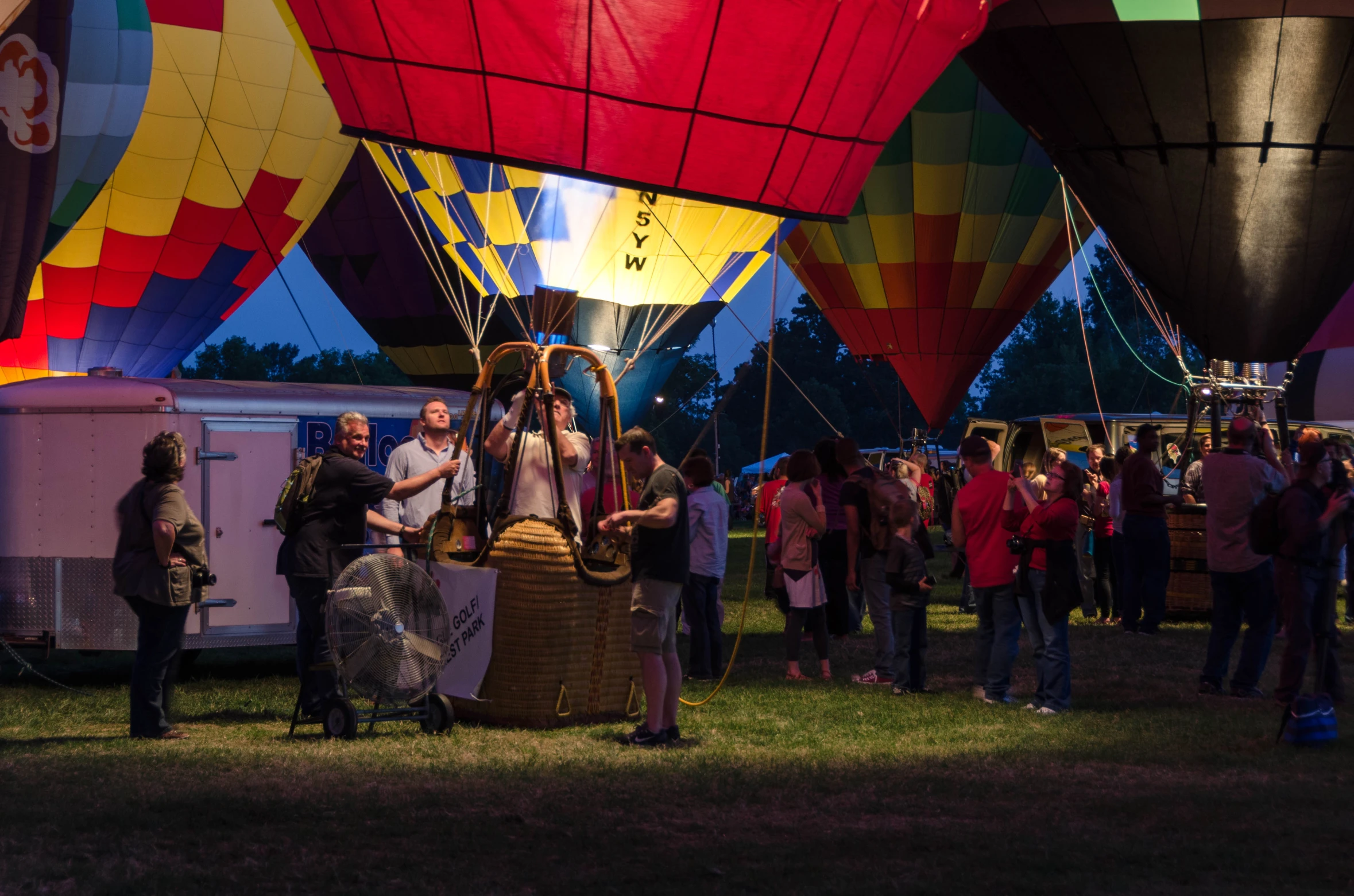 a number of  air balloons in a field