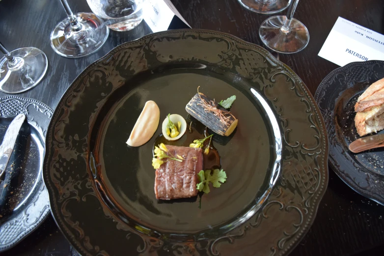 a small plate of food, with other items placed on it