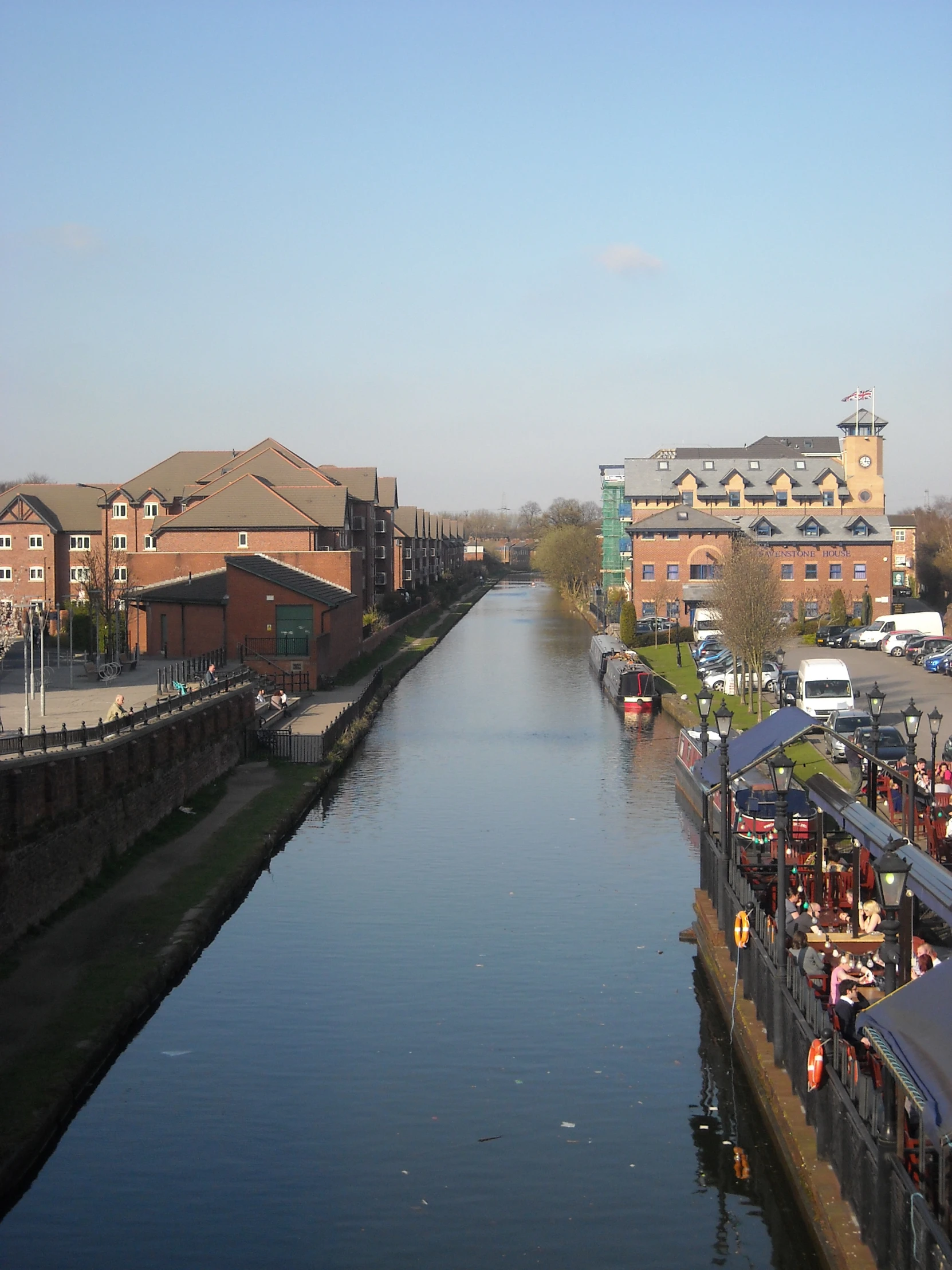 a large body of water in a city with buildings on either side