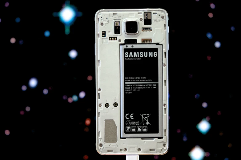 the back side of the samsung smartphone with the camera facing upwards