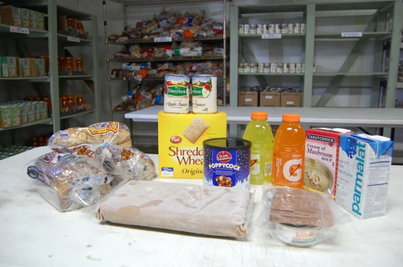 groceries being stored in a pantry at a supermarket