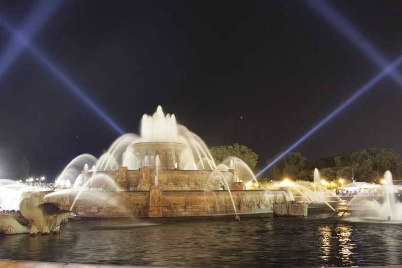 a public fountain with water shooting from it