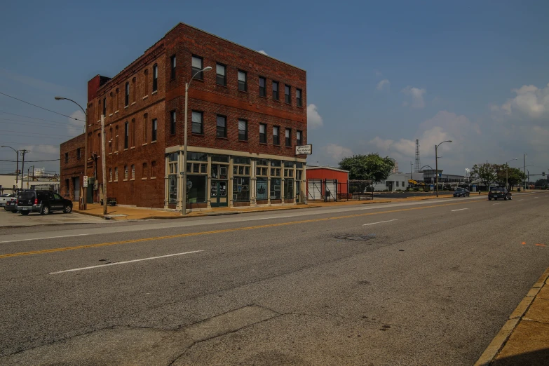 a lone street intersection in an older western town