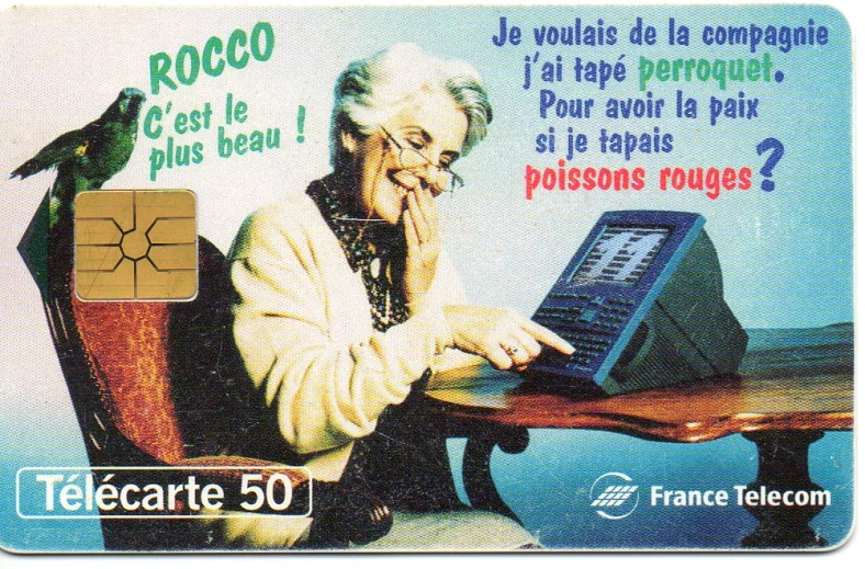 a po of a card that shows a lady at a table using a laptop