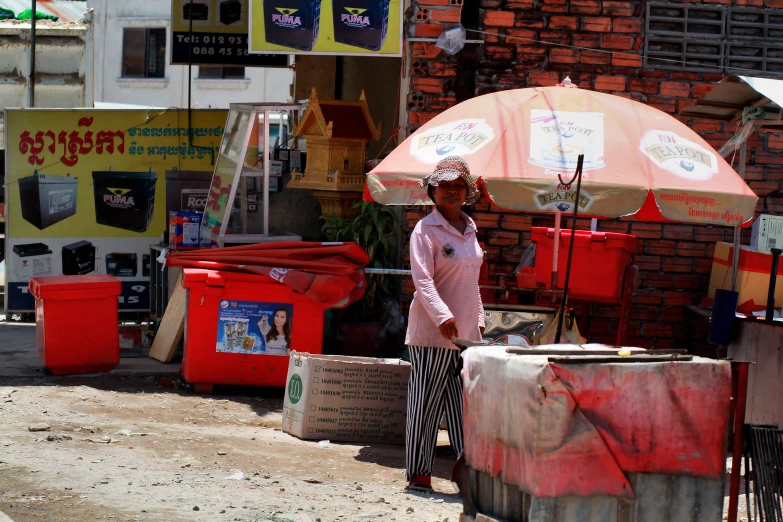 a man stands with an umbrella over his head