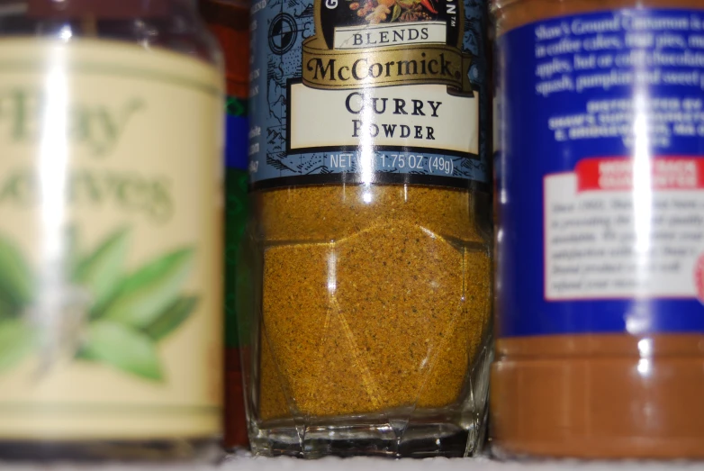a collection of spices and spices in various bottles