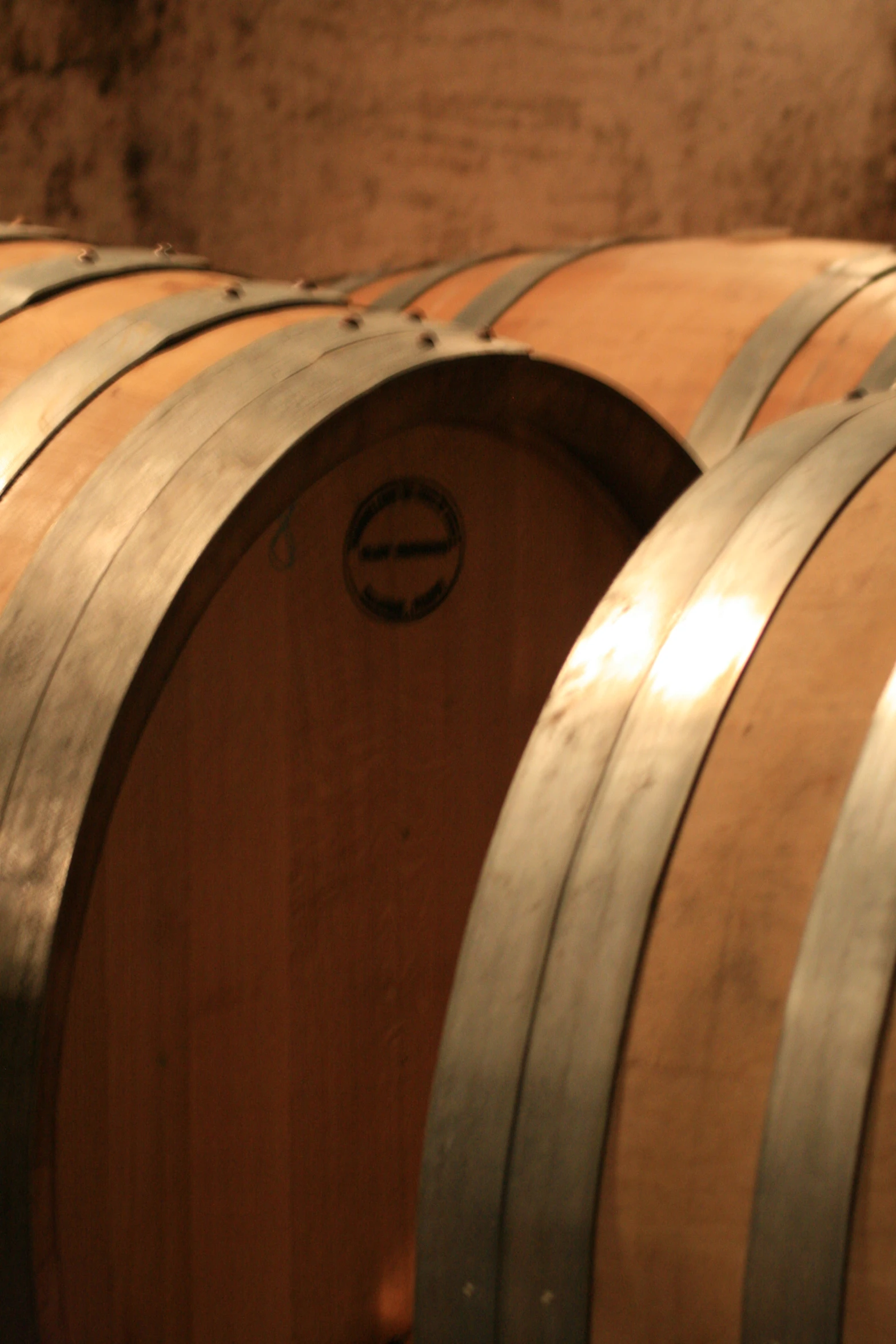 wine barrels are lined up and ready to be tasted