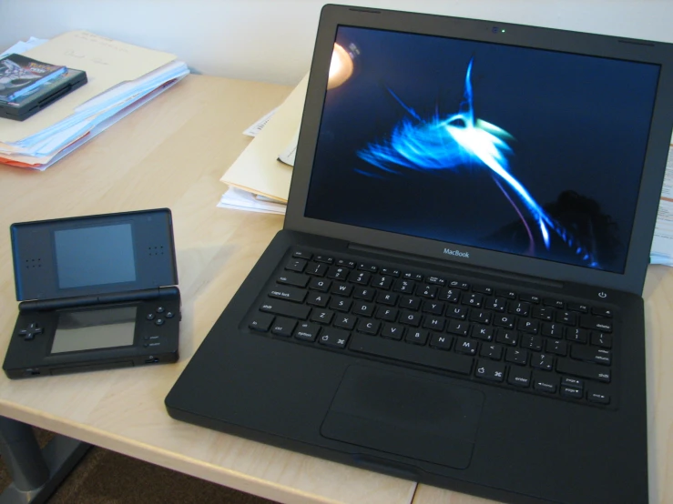 a laptop computer is set up on a desk