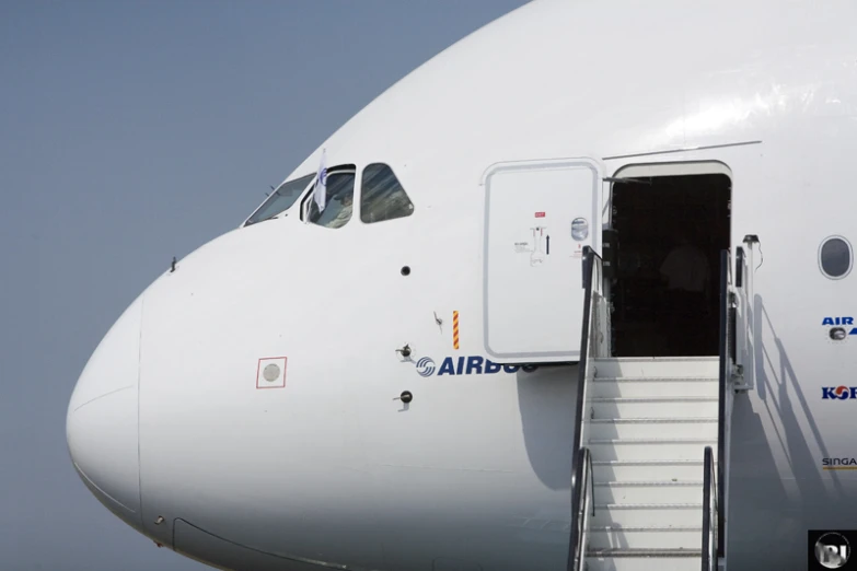 the stairs are attached to the side of an airplane