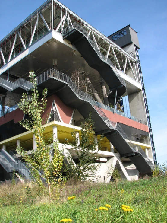 a very large building with a massive staircase on the side