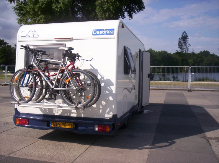 a van with two bicycles on the front