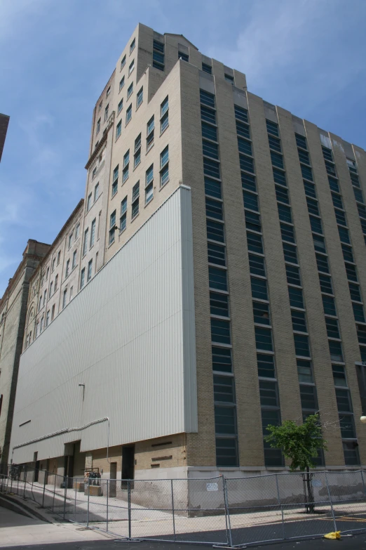 the front of a large building with several windows