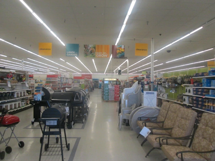 an aisle of a target store filled with furniture