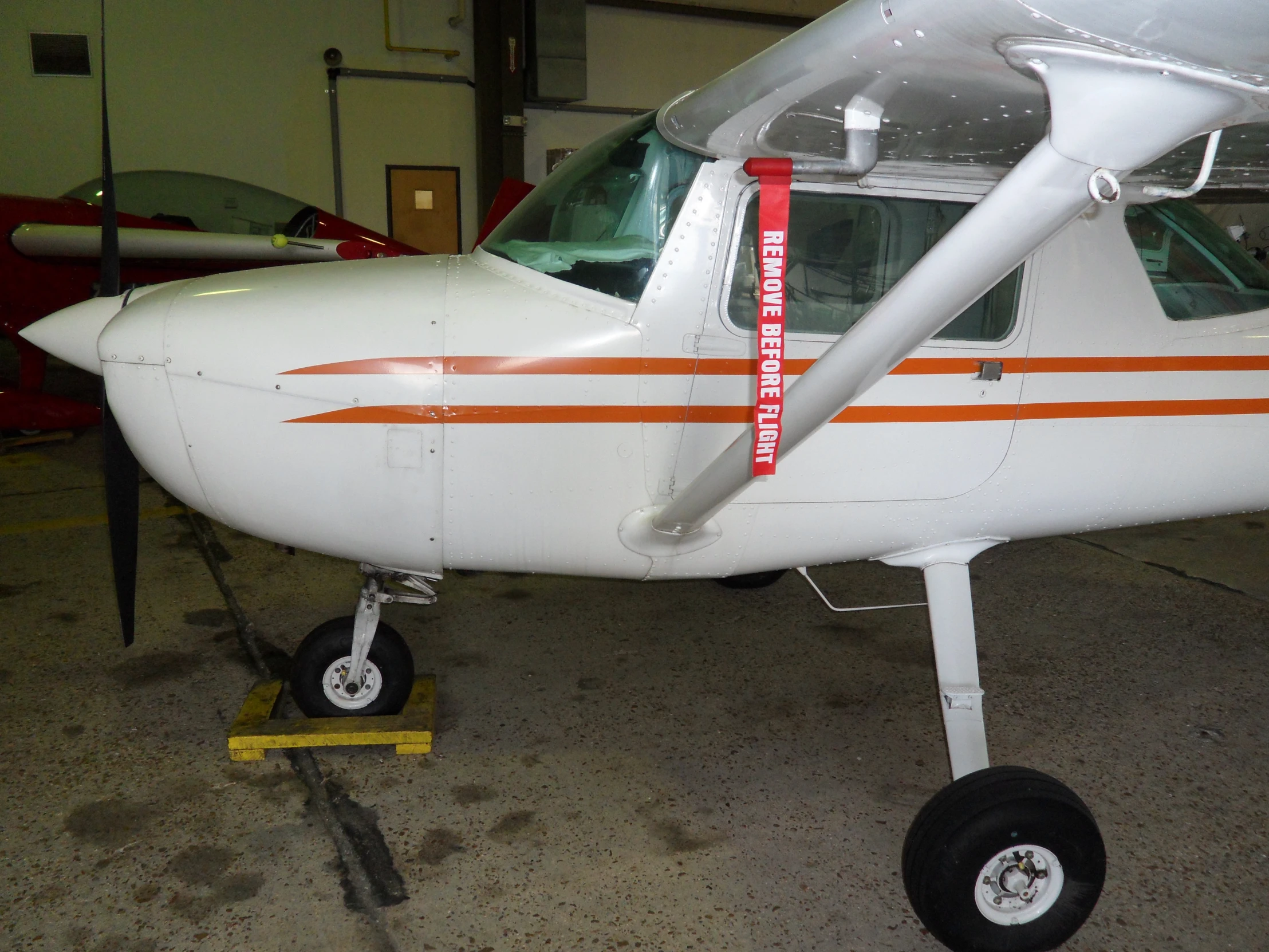 a small airplane that is on display inside