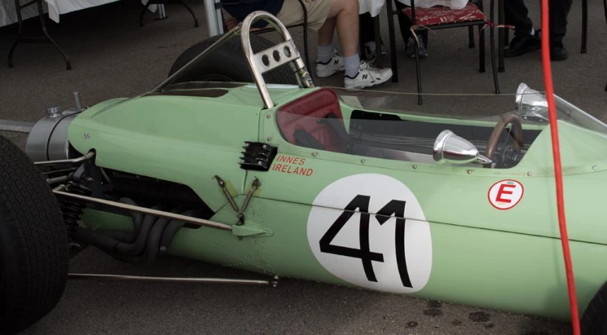 a mint green race car with number 41 on it