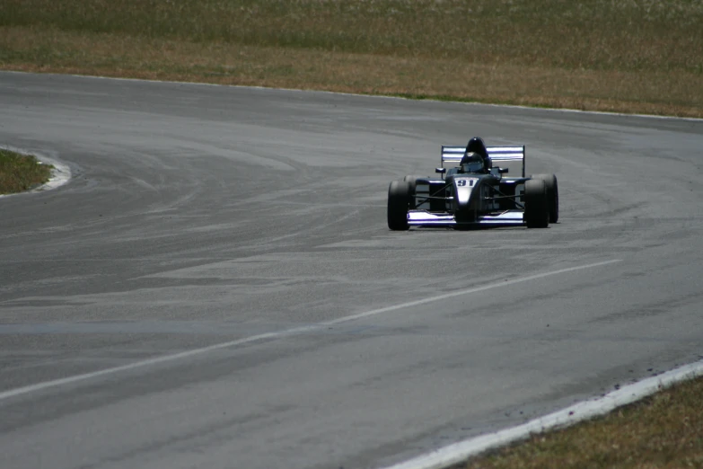 a car is going down the track during a race