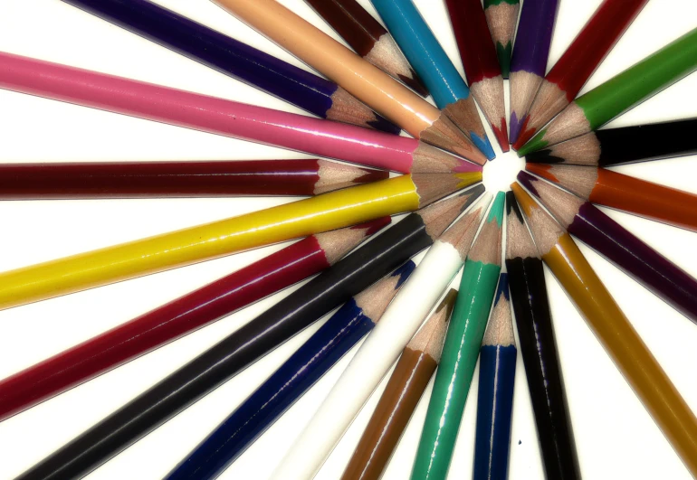 an array of colored pencils are in the same circle