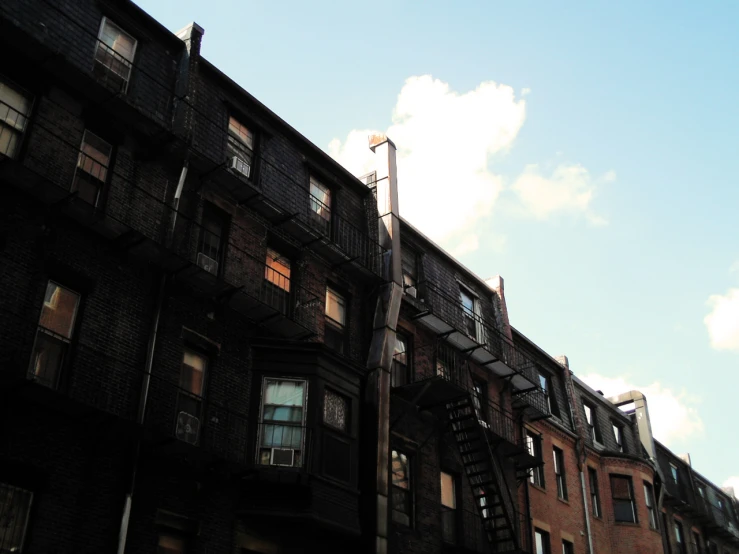 the sky is clear above many tall buildings