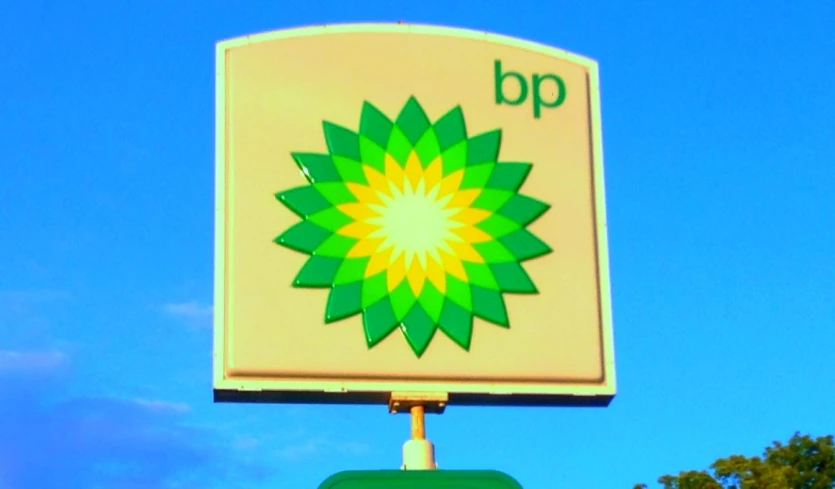 a bp sign with the logo on top