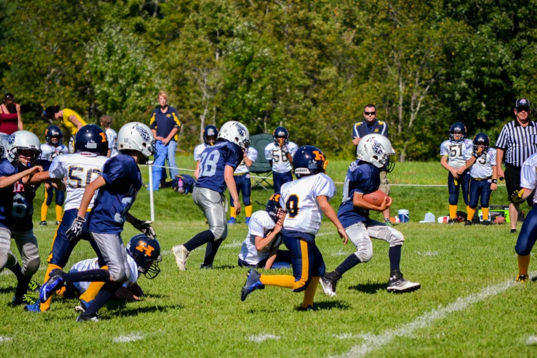 the football players are playing in the game