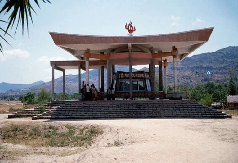 a person sits at the top of a stage